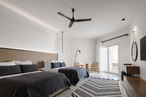 Woonvoorbeeld deluxe familiekamer tuin-, zwembad- of zeezicht