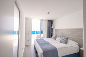 Woonvoorbeeld familiekamer suite zeezicht & gedeeltelijk zeezicht