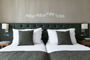 Woonvoorbeeld deluxekamer met stadszicht