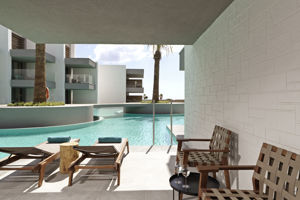 Woonvoorbeeld familiekamer met swim up land/zeezicht