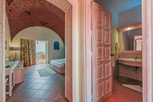 Woonvoorbeeld standaardkamer met tuinzicht, zwembadzicht of zeezicht